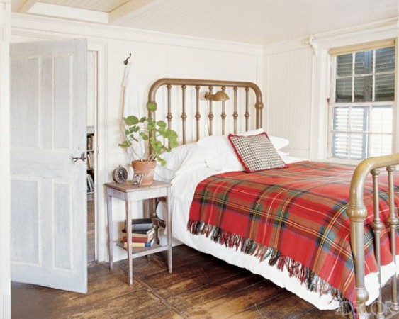 Spruce up a bedroom for fall and winter with a plaid blanket 