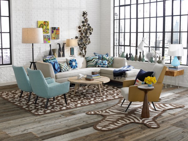 A designer living room with a zebra rug, King of Happy Chic, Jonathan Adler.