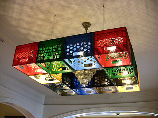 Plastic crates repurposed into a colorful light fixture 