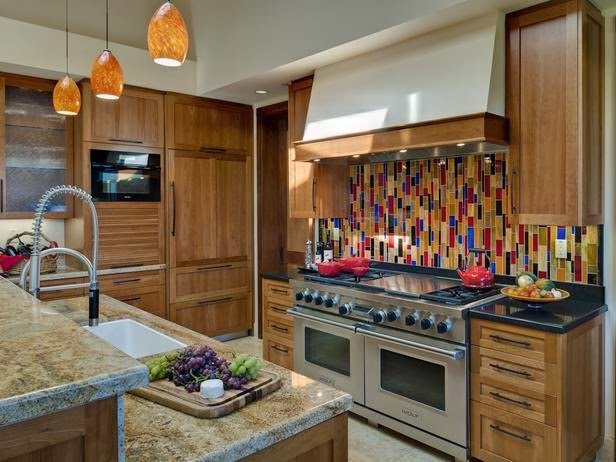 A kitchen with beautiful wooden cabinets and a character-filled backsplash.