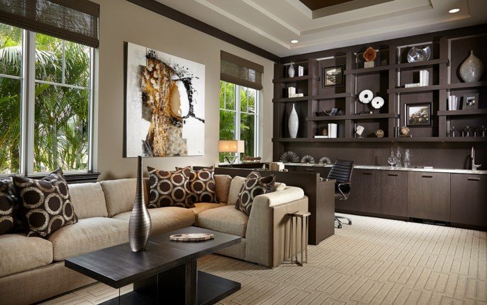 A stylish living room with a brown couch and a coffee table.