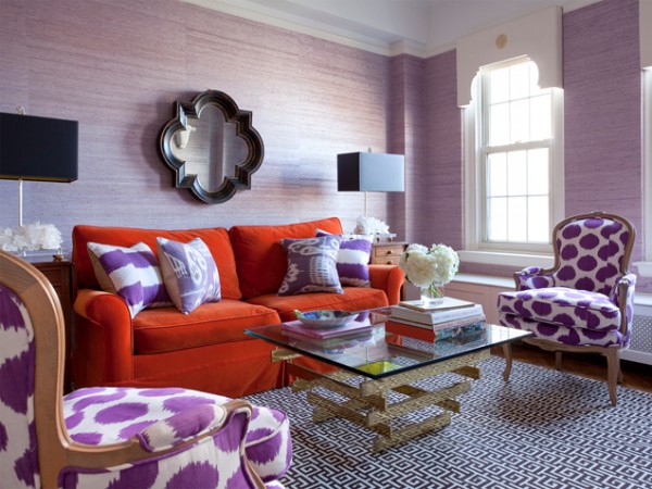 A living room with bold and vibrant upholstery.