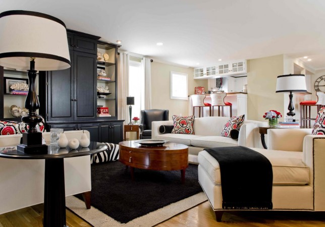 A black and white living room with a coffee table, refreshed after the holidays.