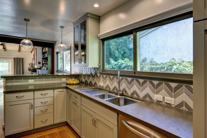 Chevron design enhances this tile kitchen backsplash