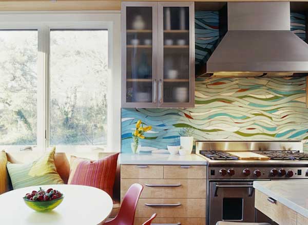 A kitchen with a stunning backsplash.