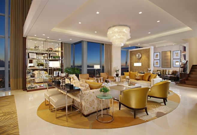 A luxury living room with a round table and chairs.