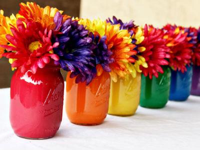 Rainbow mason jar centerpieces (celebrations).