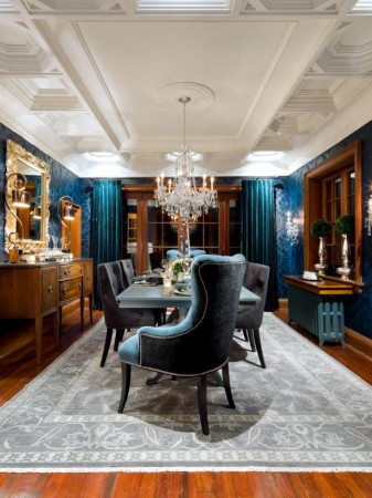 The Formal Dining Room is making a comeback with blue walls and a chandelier.