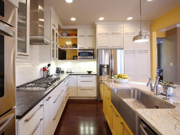 Trend Alert - A kitchen with white cabinets and yellow counter tops showcases mixed cabinet finishes.