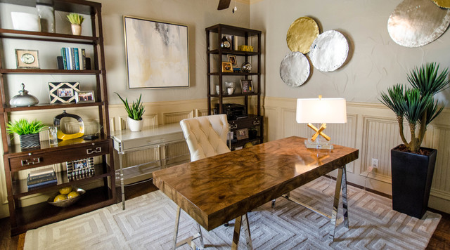 Metallic wall hangings bring shine to this home office
