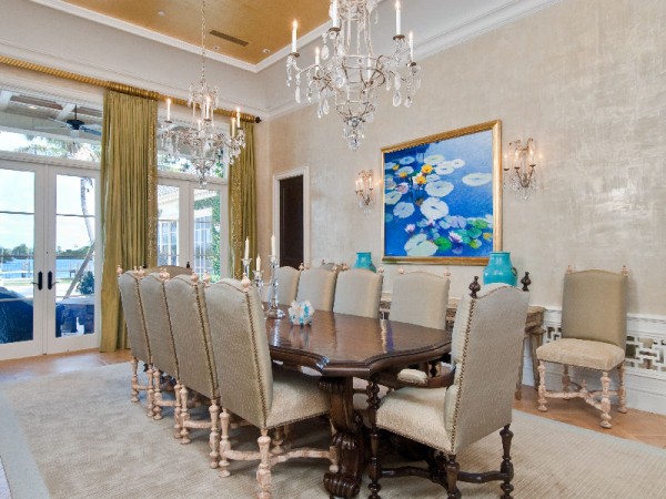 An elegant dining room with a beautiful chandelier.