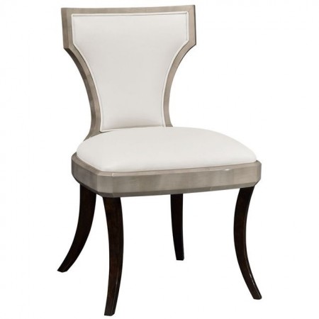A white upholstered Gatsby-style chair with a wooden frame.