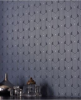 Art Deco's patterns are busy and repetitive like this wallpaper.