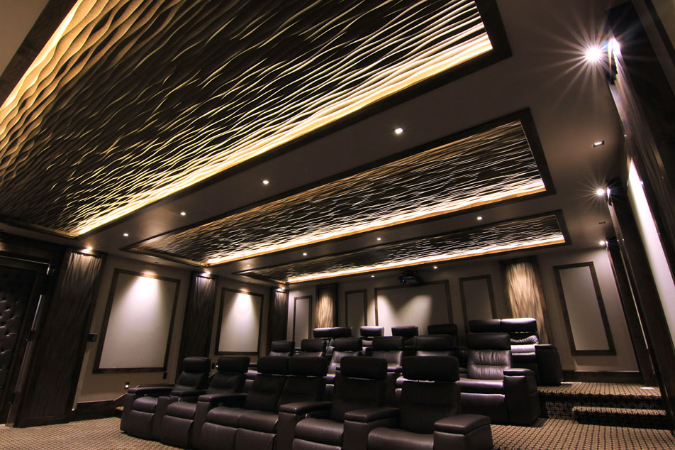 A home theater with unique leather seats and a ceiling.