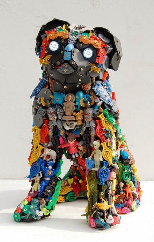 A sculpture of a pug made out of upcycled plastic toys.