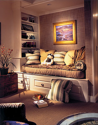 Warm reading nook with pillows (personalitycafe).