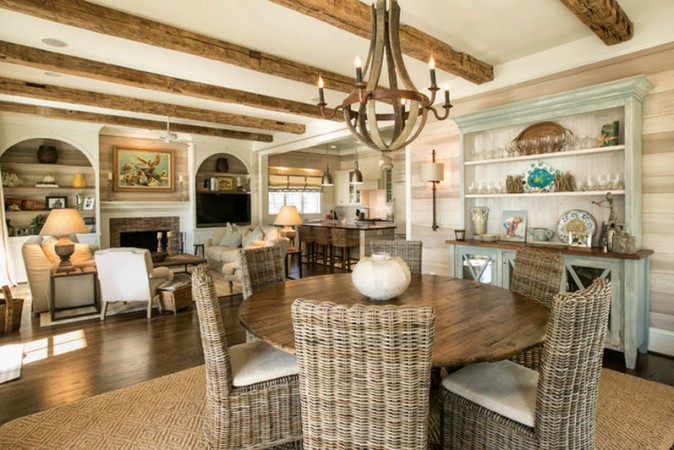 How to Get a Chic Beach Look in Your Home with wood beams and wicker furniture.