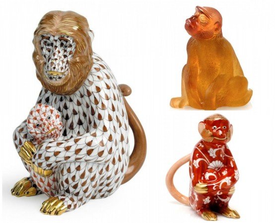 Herend monkey figurines and a Daum crystal monkey from Scully and Scully.