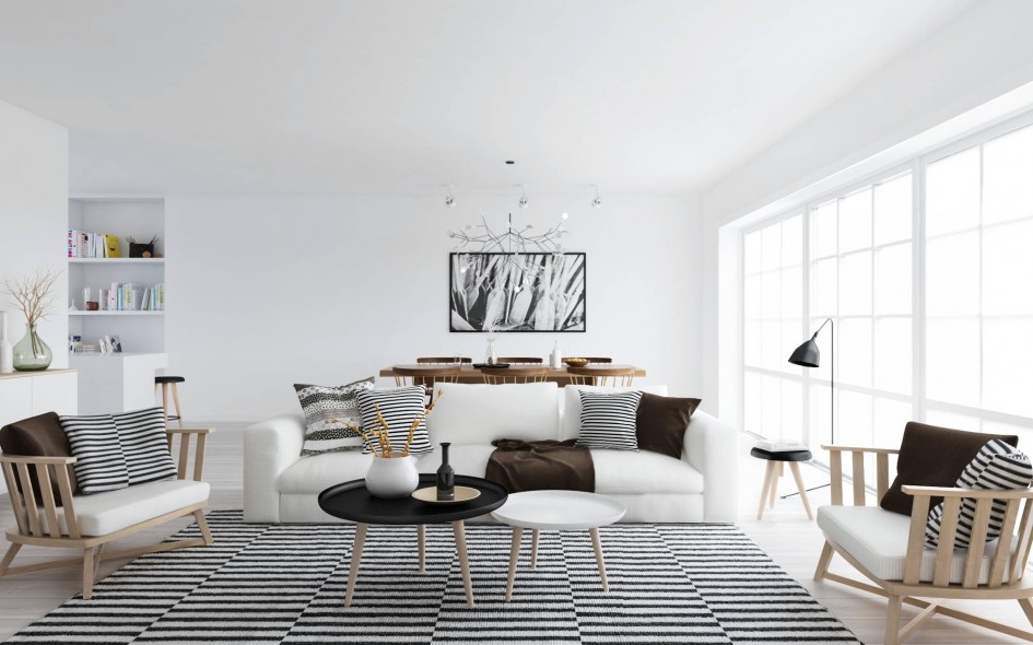 A monochrome living room with striped furniture.