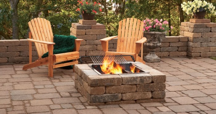 A backyard patio with a fire pit that heats up your landscape.
