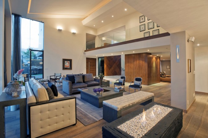 A modern living room with a fireplace that makes you say Ahhh...