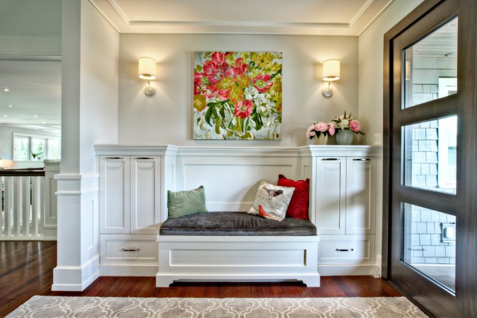 An attractive built-in bench makes this foyer cozy 