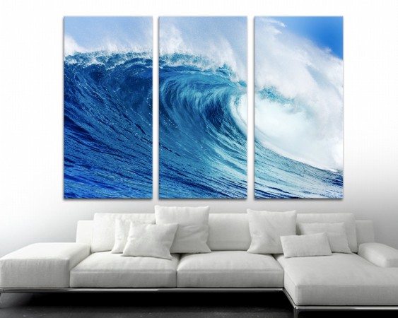 Wave triptych above sofa brings the ocean home