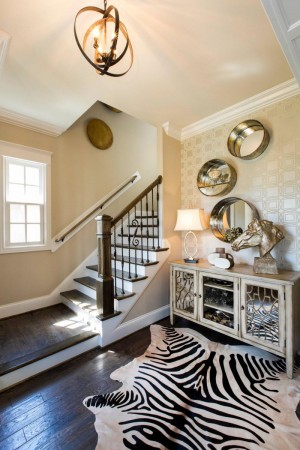 Zebra-print rug adds to the style of this foyer 