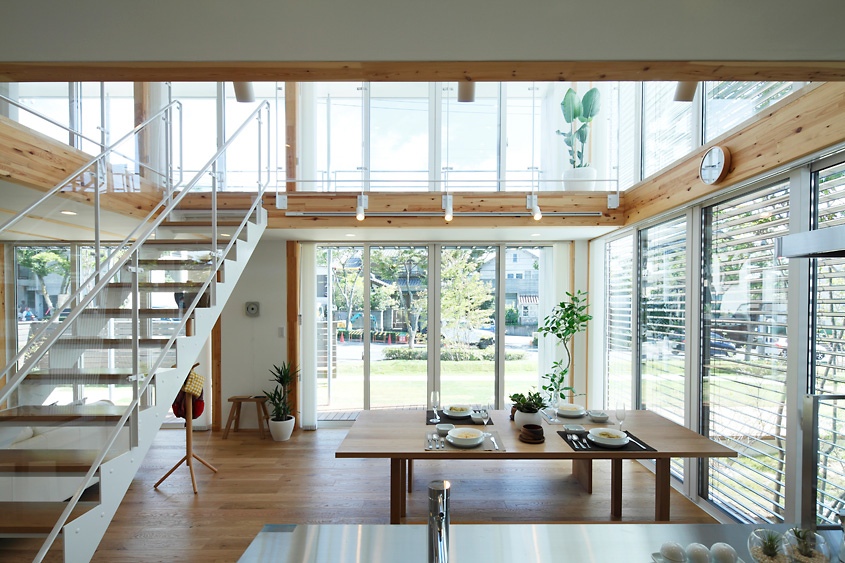 Japanese house with unique interior design featuring a prominent staircase.