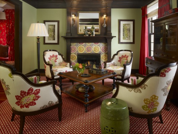 Sage green and red living room
