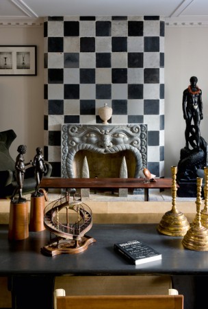 A designer-focused black and white checkered wall by Jacques Grange.