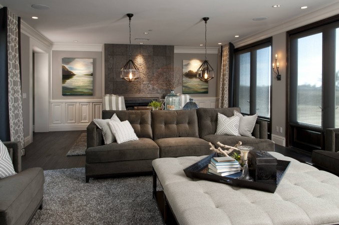 A living room with gray couches and a coffee table that makes you say Ahhh...