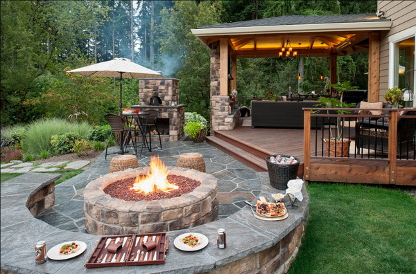 A backyard with a fire pit.