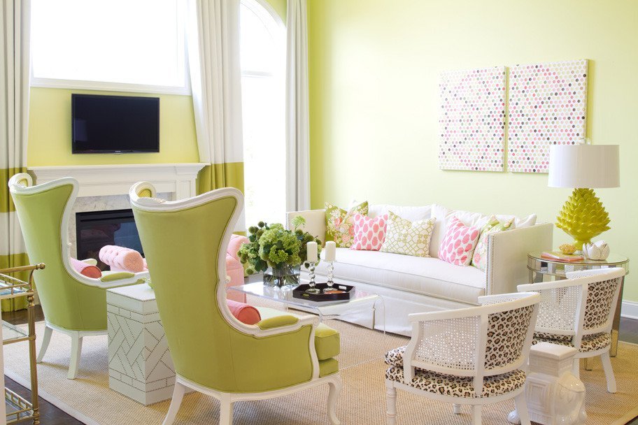 A living room with lime green walls, offering light and fresh interiors for spring inspiration.