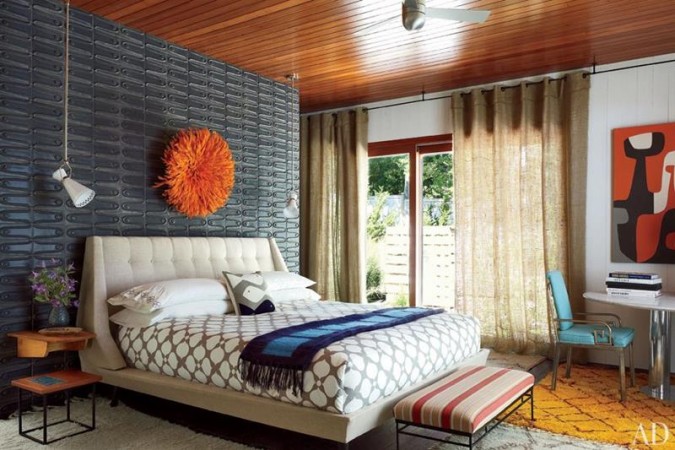 The Mid-Century Modern Bedroom with a bed and a bedside table.