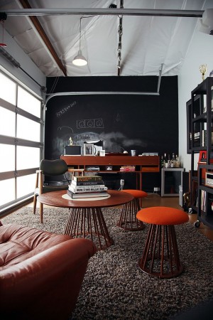 The Mid-Century Modern Home Office with a table and chairs.