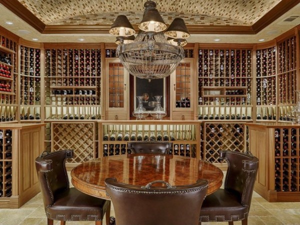 A creative wine cellar with a table and chairs.