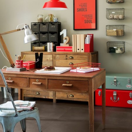 The Industrial Style Home Office with a red lamp and a wooden desk.