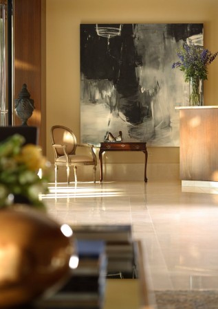 Using Abstract Art in Your Home: Enhance your living space with a large painting on the wall.