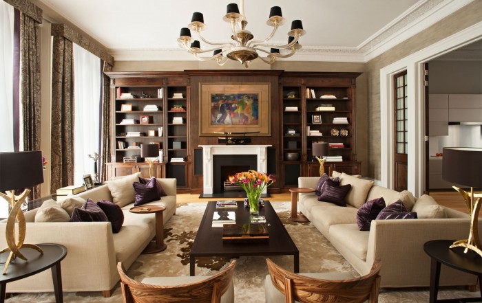 Get the Look of Refined Luxury in Your Living Room with Couches and a Fireplace.