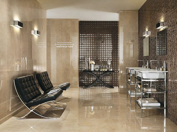 A bathroom with beige walls and black furniture featuring porcelain flooring.