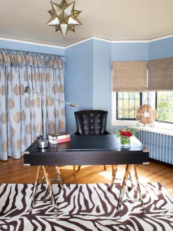 Pretty blue walls and bold prints give this home office a lift