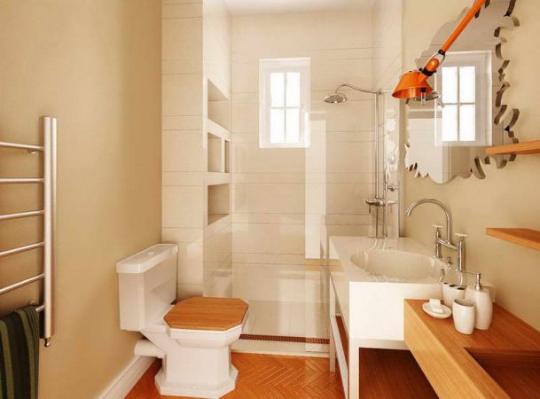 A budget-friendly bathroom with wooden floors and a toilet.