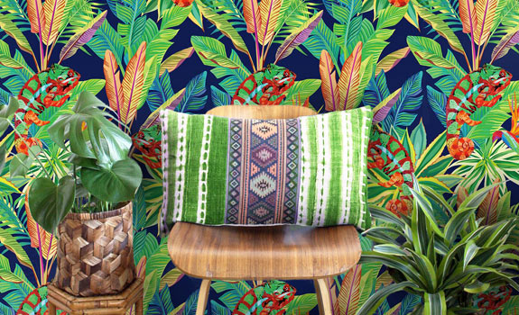 A tropical wallpaper with a chair.
