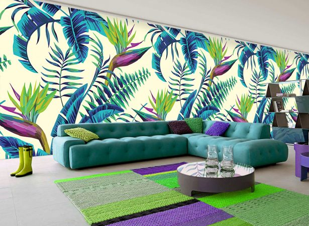 A living room with a vibrant tropical wall mural.