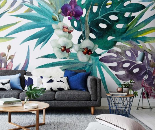 A living room with a tropical wall mural showcasing the tropics.