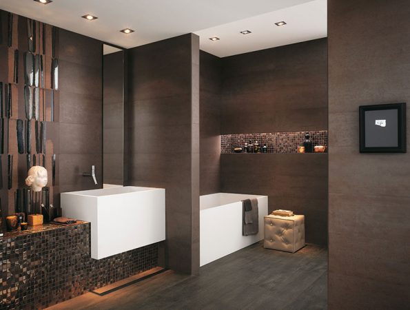 A bathroom with beautiful tile ideas and brown walls.
