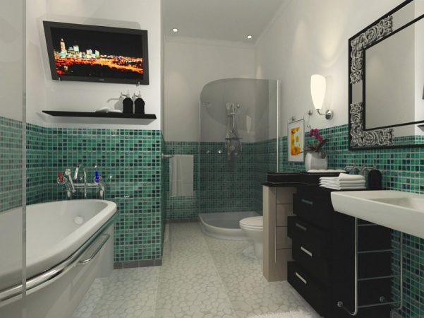 A bathroom with beautiful green tiled walls.