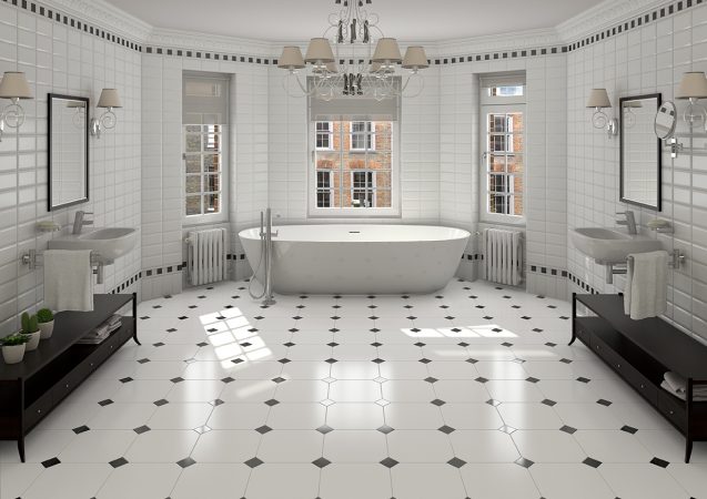 A beautiful bathroom with black and white tiles.