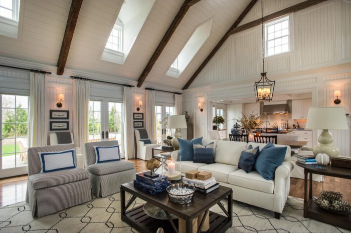 A Cape Cod living room with wood beams.